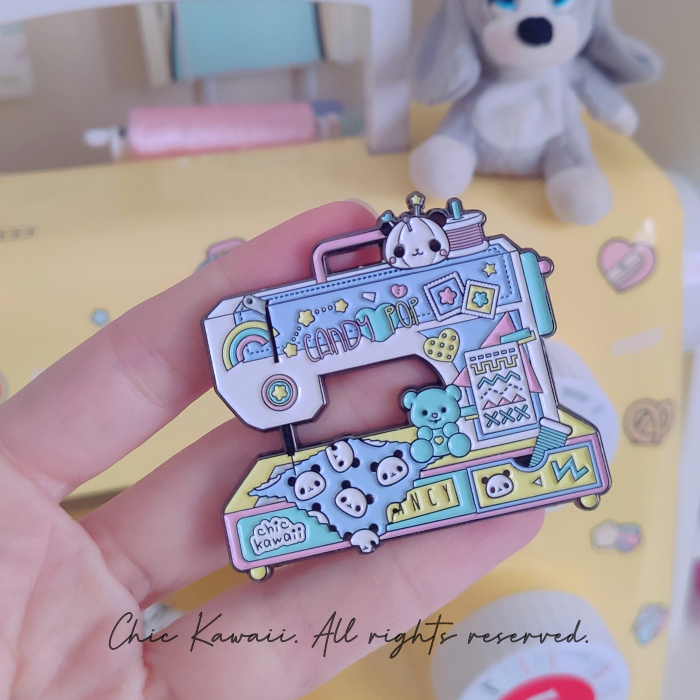 Chic kawaii sewing machine pin.